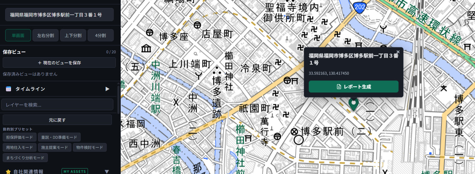 A map view after selecting the address "福岡県福岡市博多区博多駅前一丁目3番1号," showing a green pin at the location with a popup displaying the coordinates (33.592163, 130.417450) and a "Generate Report" button