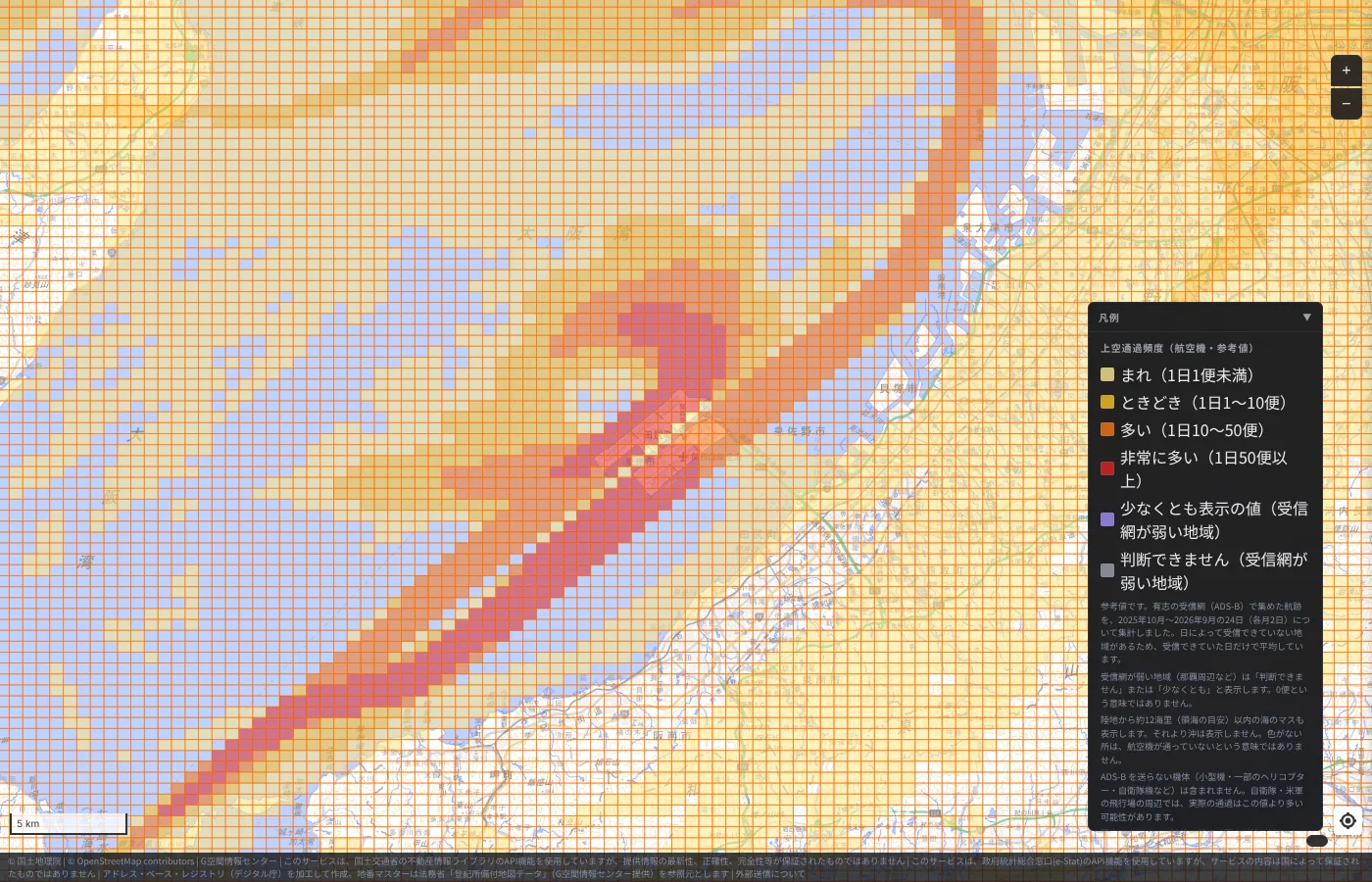 Aircraft overflight map of the whole of Osaka Bay including Kansai International Airport. A red band runs southwest from the island and an orange band arcs to the northeast