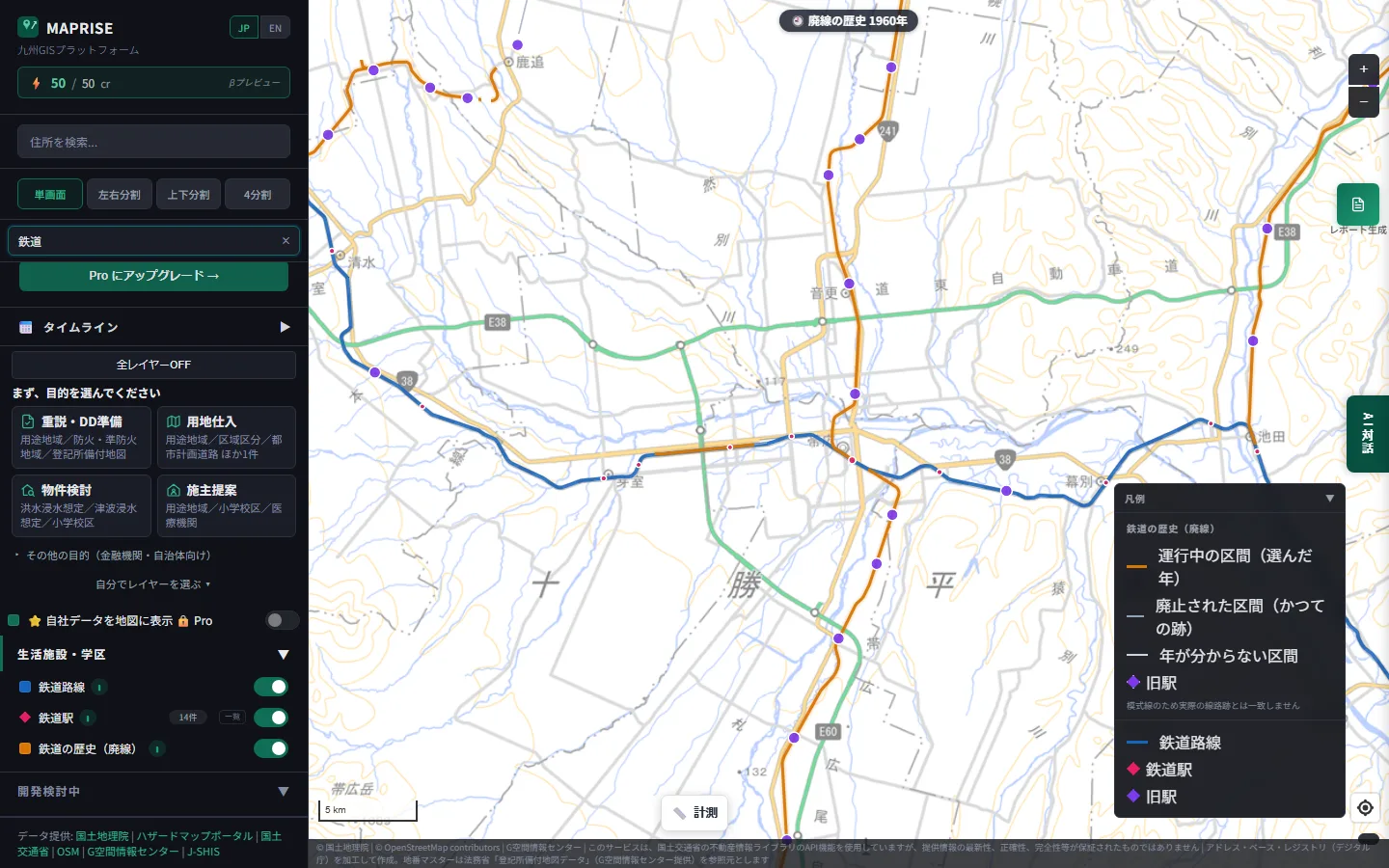 The same map with the closed-lines layer overlaid and the year set to 1960. In addition to the blue current line, orange lines fan out north and south from Obihiro, with purple former stations along them