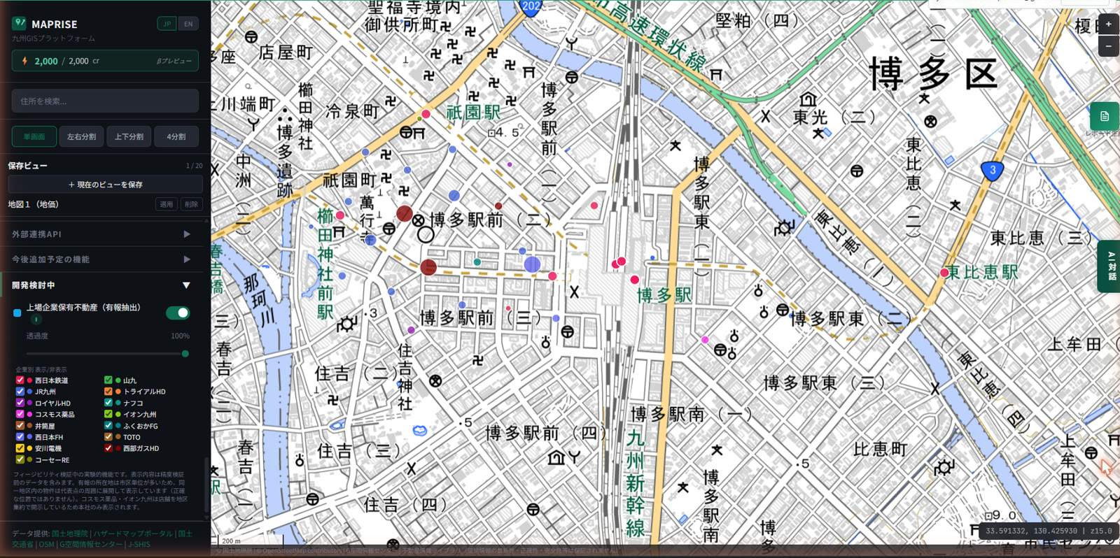 Map around Hakata Ward, Fukuoka City, showing a dense cluster of markers for real estate held by multiple listed companies — Nishi-Nippon Railroad, JR Kyushu, Trial Holdings, Aeon Kyushu, and others — each color-coded by company