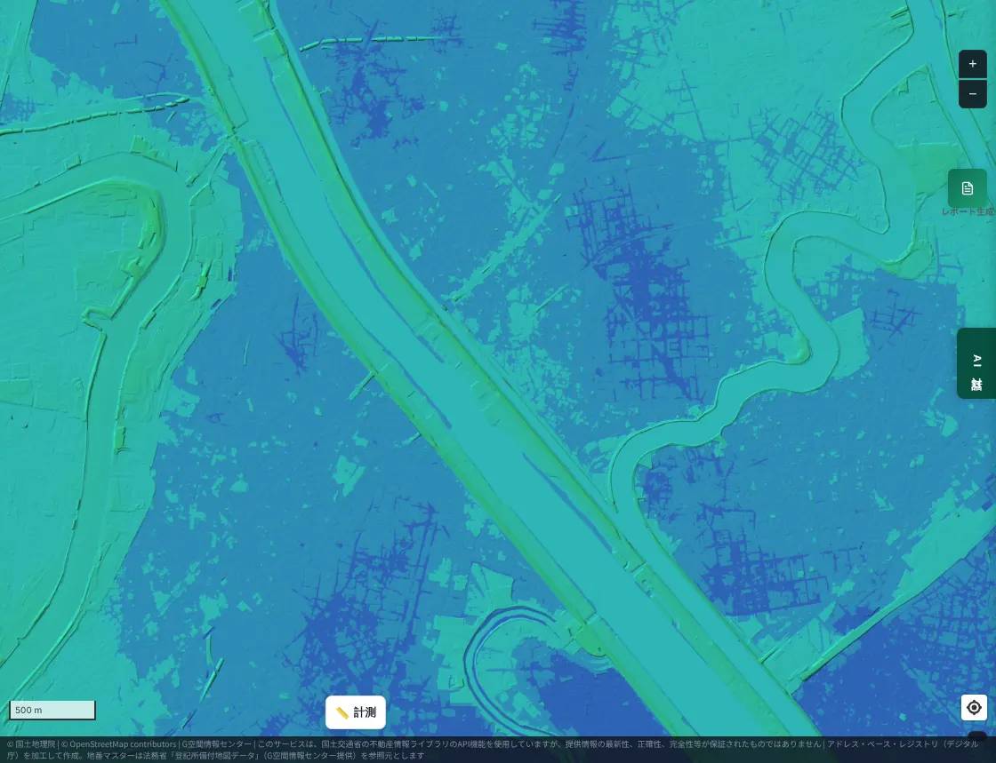 A color-coded elevation map near Katsushika and Adachi wards, Tokyo. The Arakawa flows from northwest to southeast as a broad band. The urban areas around the river are almost entirely low blue-green to blue land