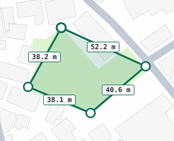 Close-up of the same plot traced by clicking four corners, each side labelled with its length (52.2 m, 40.6 m, 38.1 m, 38.2 m).